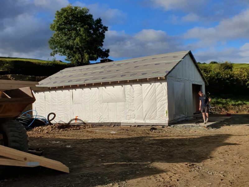 Lodge shell wrapped in breather membrane before the external cladding goes on